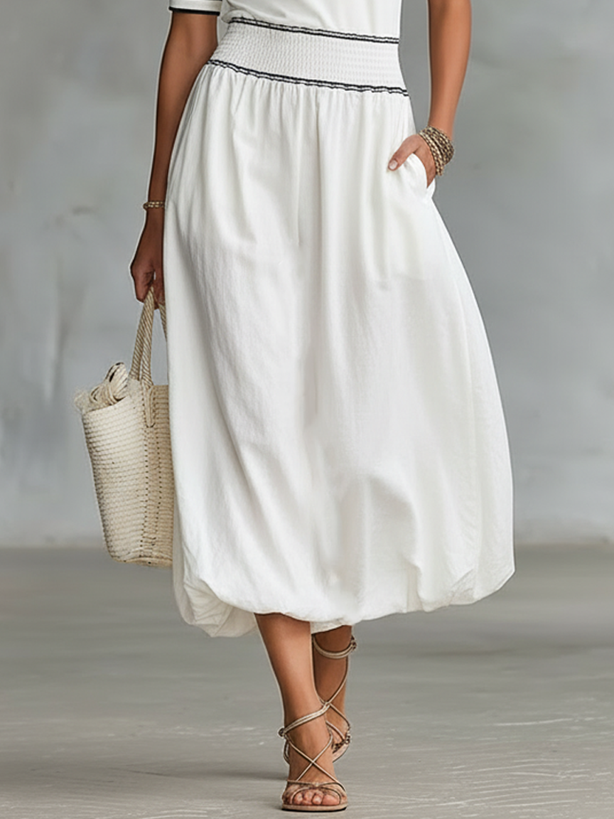 EMMA | VESTIDO MAXI MINIMALISTA CON VIVOS NEGROS Y MANGAS CORTAS