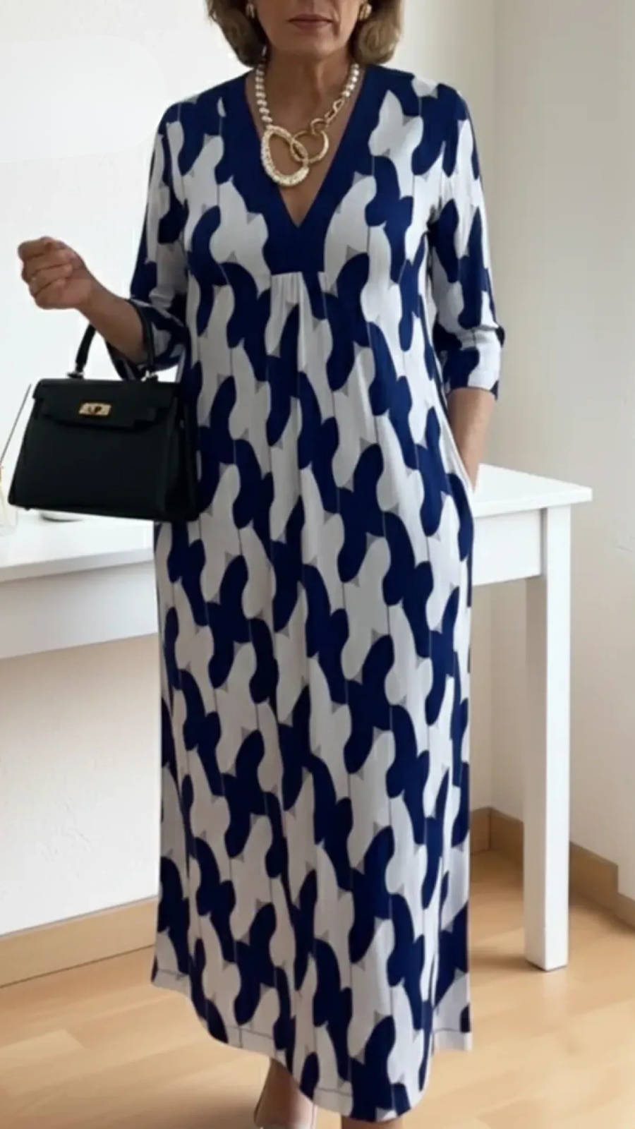 VESTIDO LARGO FLUIDO CON ESCOTE EN V Y MANGAS 3/4