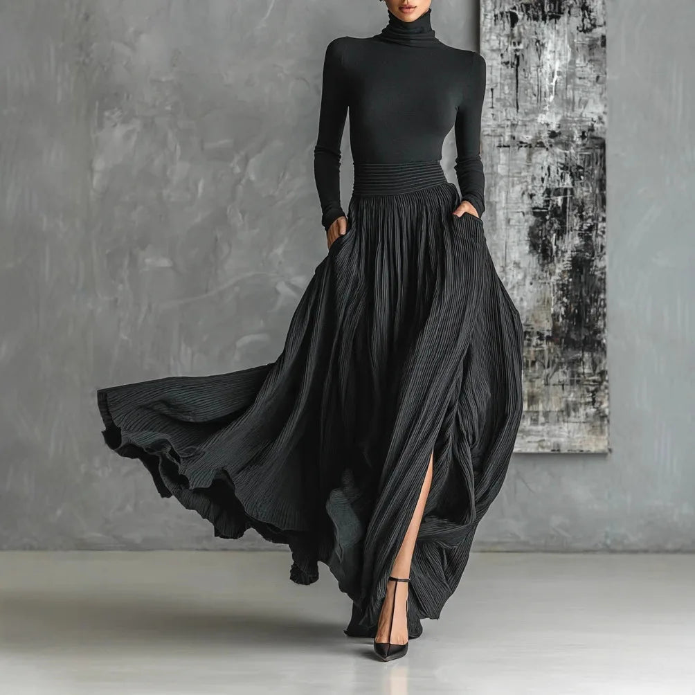 VESTIDO LARGO NEGRO PLISADO CON CUELLO ALTO KEZIAH
