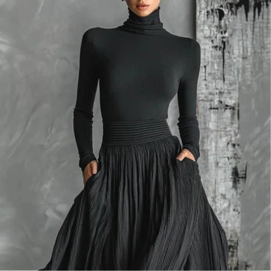 VESTIDO LARGO NEGRO PLISADO CON CUELLO ALTO KEZIAH