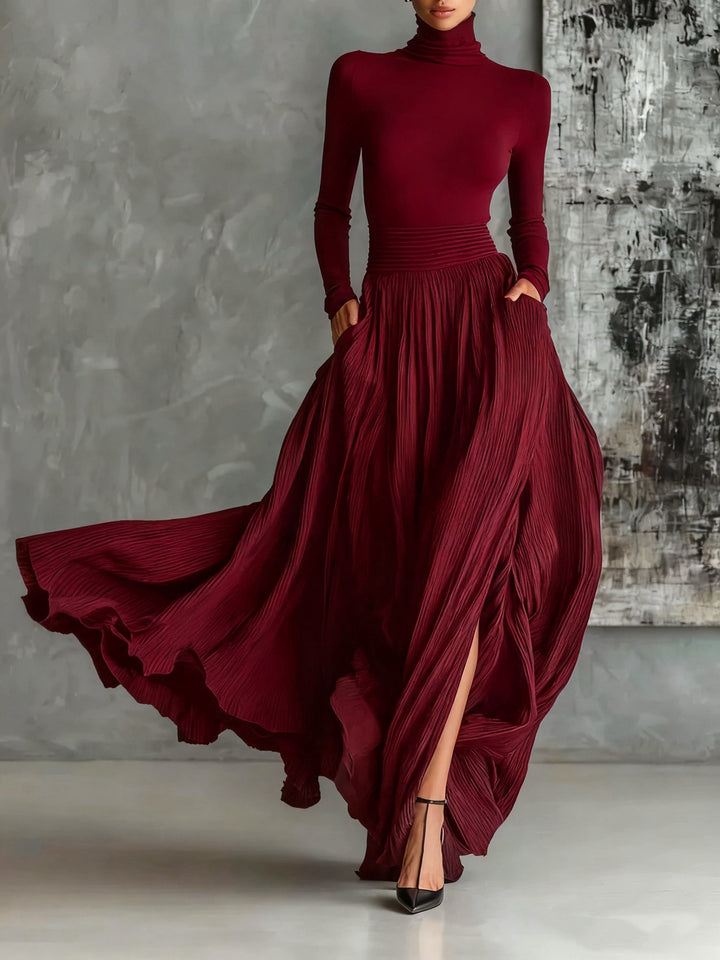 VESTIDO LARGO NEGRO PLISADO CON CUELLO ALTO KEZIAH
