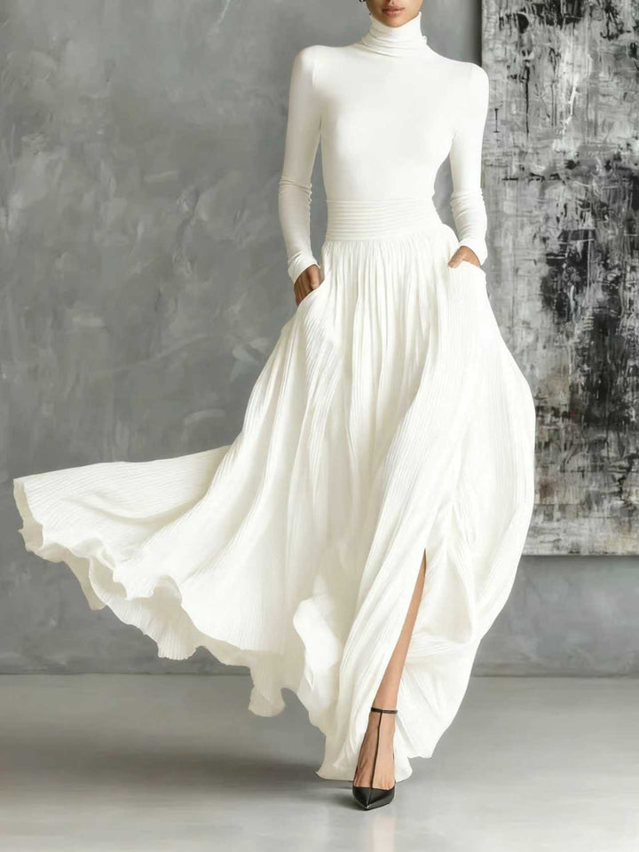 VESTIDO LARGO NEGRO PLISADO CON CUELLO ALTO KEZIAH