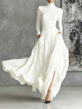 VESTIDO LARGO NEGRO PLISADO CON CUELLO ALTO KEZIAH