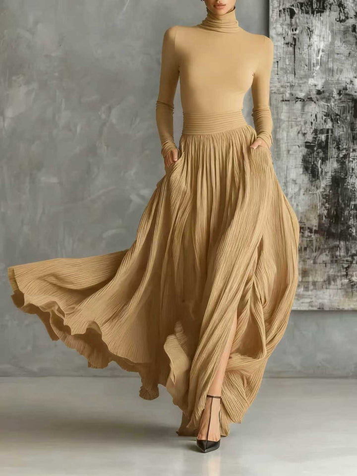 VESTIDO LARGO NEGRO PLISADO CON CUELLO ALTO KEZIAH
